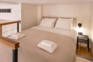 Ένα ή περισσότερα κρεβάτια σε δωμάτιο στο Design Flower Square Apartments +45 φωτογραφίες