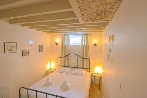 En eller flere senge i et værelse på Les Mouettes + 21 billeder