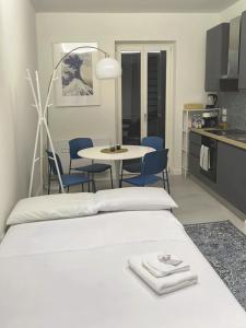 Η κουζίνα ή μικρή κουζίνα στο Appartamento Hokusai +7 φωτογραφίες