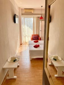 Postel nebo postele na pokoji v ubytování Eleana Apartments