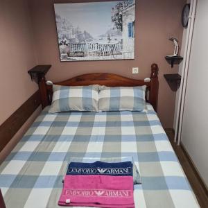 Llit o llits en una habitació de Apartman EXKLUZIV