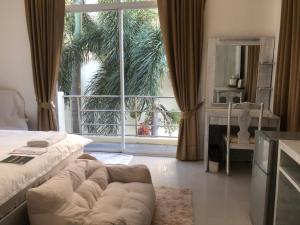 Postel nebo postele na pokoji v ubytování TIL DAWN Phuket
