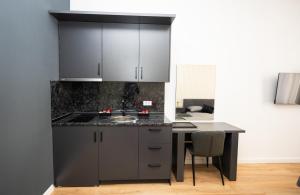 Η κουζίνα ή μικρή κουζίνα στο Design City Center Apartments