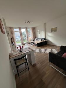 Χώρος καθιστικού στο Barrierefreie Erdgeschossferienwohnung Lübeck +10 φωτογραφίες