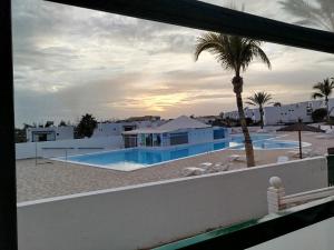 Bazén v ubytování Casa Los Tuscanes nebo v jeho okolí