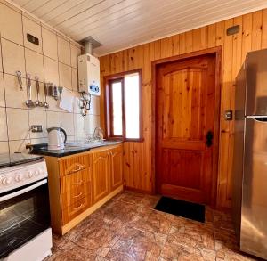 Kuchyň nebo kuchyňský kout v ubytování Cabaña en Dalcahue