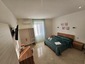 Postel nebo postele na pokoji v ubytování B&B Esterina