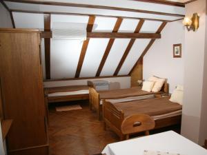 Posteľ alebo postele v izbe v ubytovaní Apartments Vrata Baranje