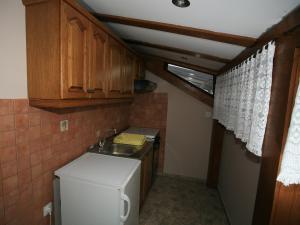 Kuchyňa alebo kuchynka v ubytovaní Apartments Vrata Baranje