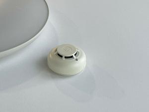 a small white object sitting on a table next to a bowl at LHOME CÁDIZ in Cádiz