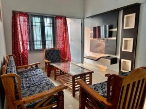 Posezení v ubytování Fresh & Spacious 2BHK 401