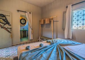 Postel nebo postele na pokoji v ubytování Nomad
