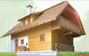 ein Modell eines Holzhauses mit einem Dach in der Unterkunft Brandluckner Nesterl in Heilbrunn