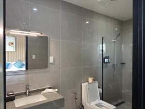 Koupelna v ubytování Taufusi Hotel + 26 fotografií
