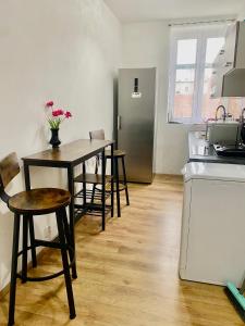Kuchyň nebo kuchyňský kout v ubytování Kael Apartment
