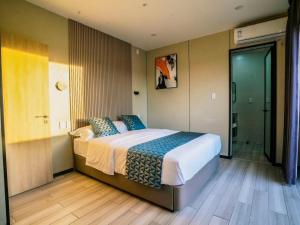 Postel nebo postele na pokoji v ubytování Taufusi Hotel