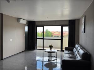 Posezení v ubytování Taufusi Hotel