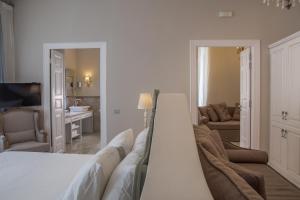 Postel nebo postele na pokoji v ubytování Micra Anglia Boutique Hotel & Spa