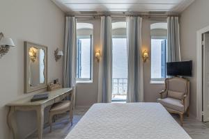 TV a/nebo společenská místnost v ubytování Micra Anglia Boutique Hotel & Spa