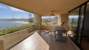 Gallery image of PUNTA FRAILE HAMACA SUITES Frente mar, 140 m2, amplias areas verdes, piscina, hamaca, tranquilidad in Algarrobo