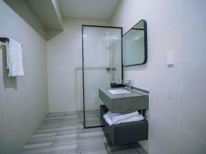 Koupelna v ubytování Taufusi Hotel