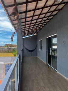Balkón nebo terasa v ubytování Casa em Barra de jacuipe + 32 fotografií
