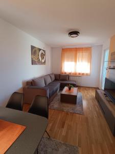 Area soggiorno di Luksuzni Apartman Ema