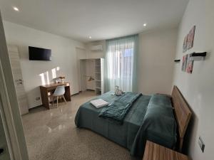 Postel nebo postele na pokoji v ubytování B&B Esterina