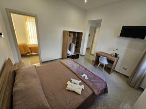Postel nebo postele na pokoji v ubytování B&B Esterina
