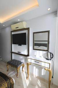 TV a/nebo společenská místnost v ubytování Istanbul Hotel&Guesthouse
