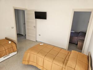 Postel nebo postele na pokoji v ubytování B&B Esterina