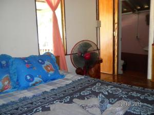 Voodi või voodid majutusasutuse Koh Mak Green View Resort toas