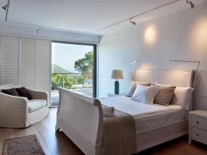 Ένα ή περισσότερα κρεβάτια σε δωμάτιο στο Villa in Ibiza with Infinity Pool & Views +32 φωτογραφίες