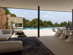 Πισίνα στο ή κοντά στο Villa in Ibiza with Infinity Pool and Sea Views