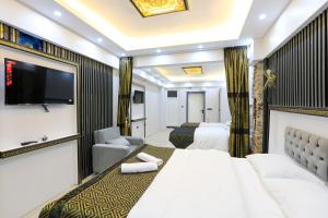 TV a/nebo společenská místnost v ubytování Istanbul Hotel&Guesthouse