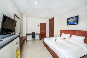 Μια τηλεόραση ή/και κέντρο ψυχαγωγίας στο The Topaz Residence Phuket Town +29 φωτογραφίες