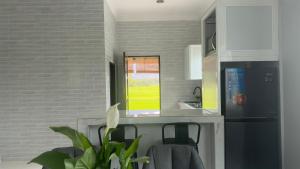 Kuchyň nebo kuchyňský kout v ubytování DVilla Guesthouse Langkawi