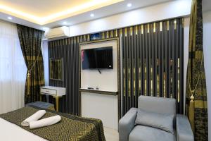 TV a/nebo společenská místnost v ubytování Istanbul Hotel&Guesthouse