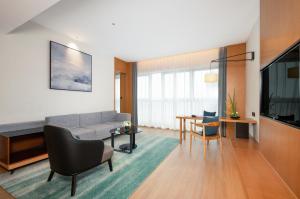 TV a/nebo společenská místnost v ubytování Fairfield by Marriott Zhuhai Xiangzhou