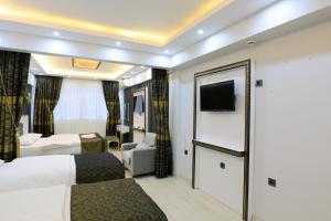 Postel nebo postele na pokoji v ubytování Istanbul Hotel&Guesthouse