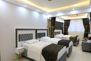 Postel nebo postele na pokoji v ubytování Istanbul Hotel&Guesthouse