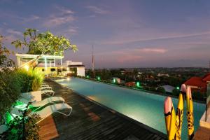 a swimming pool on top of a building at MaxOneHotels at Bukit Jimbaran in Jimbaran