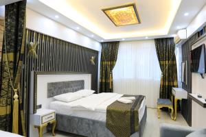 Postel nebo postele na pokoji v ubytování Istanbul Hotel&Guesthouse