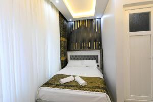 Postel nebo postele na pokoji v ubytování Istanbul Hotel&Guesthouse