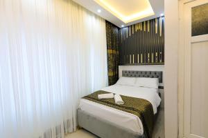 Postel nebo postele na pokoji v ubytování Istanbul Hotel&Guesthouse
