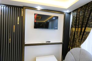 TV a/nebo společenská místnost v ubytování Istanbul Hotel&Guesthouse