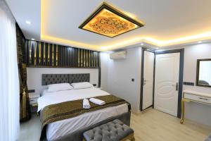 Postel nebo postele na pokoji v ubytování Istanbul Hotel&Guesthouse