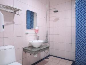 Koupelna v ubytování Siang Ti Ya Homestay + 34 fotografií