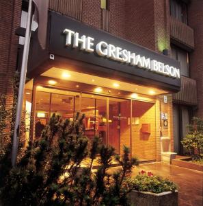 a building with a sign that reads the chestnut bacon at Gresham Belson Hotel Brussels in Brussels