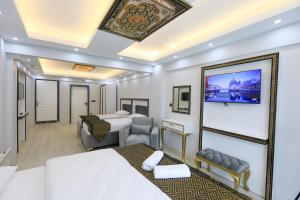 TV a/nebo společenská místnost v ubytování Istanbul Hotel&Guesthouse
